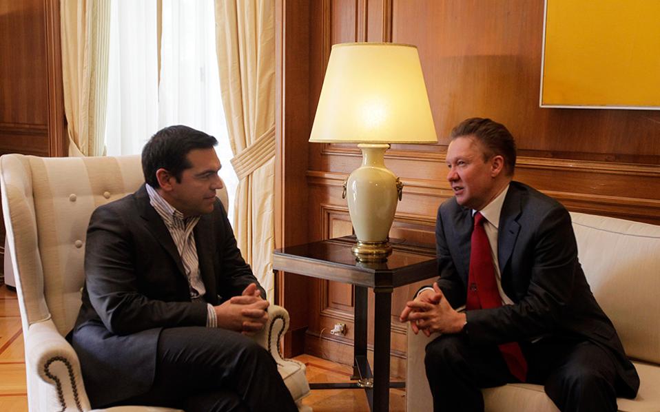 Ο πρωθυπουργός Αλέξης Τσίπρας συνομιλεί με τον επικεφαλής της Gazprom Αλεξέι Μίλερ κατά τη συνάντηση τους στην Αθήνα.